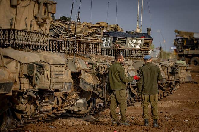 Israeli soldiers during the temporarily truce near the Israeli-Gaza border in southern Israel on Nov. 27, 2023. Photo by Yonatan Sindel/Flash90.