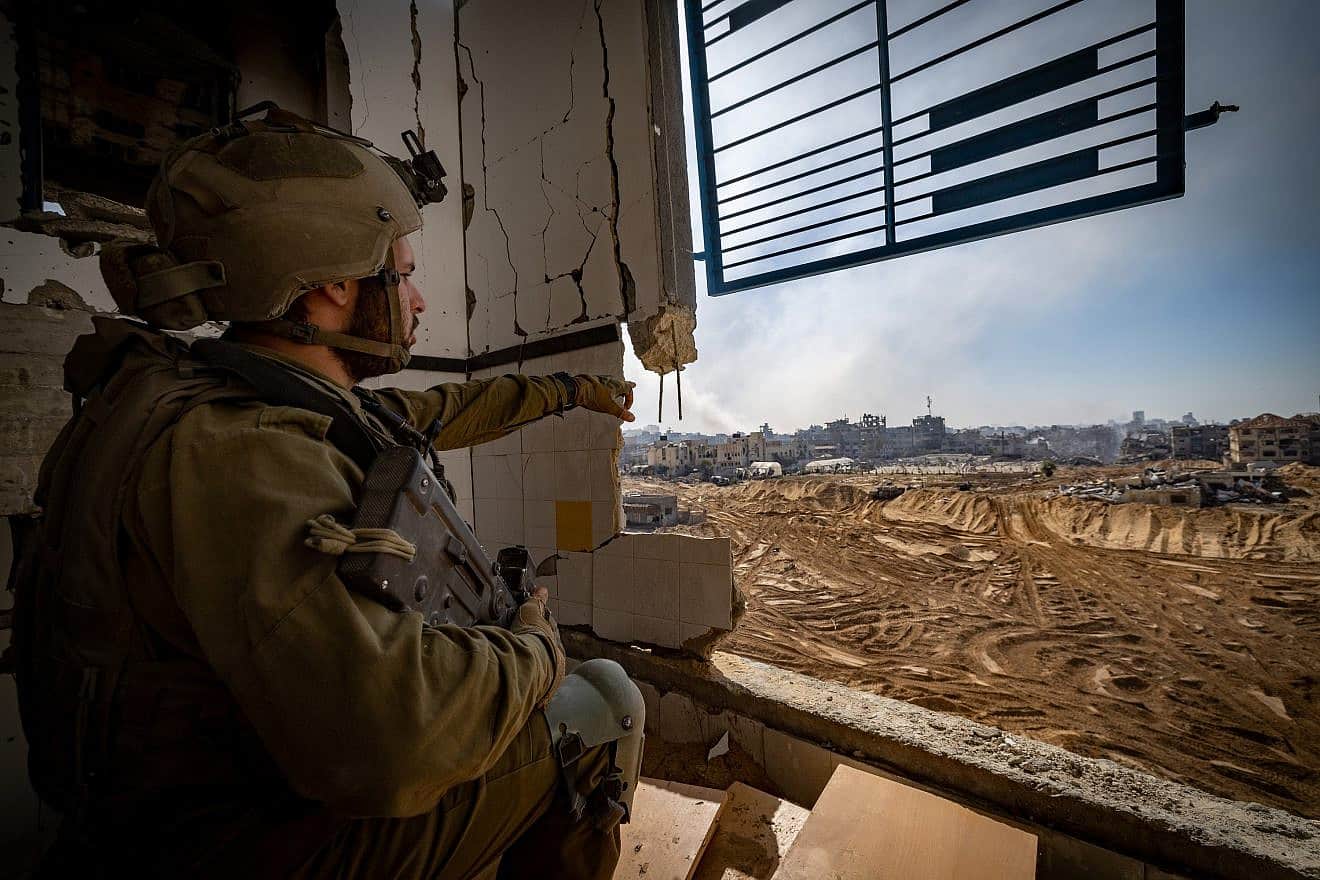 Israeli soldiers at the Al-Shati refugee camp in the northern Gaza Strip during an Israeli military operation on Nov. 16, 2023. Photo by Yonatan Sindel/Flash90.