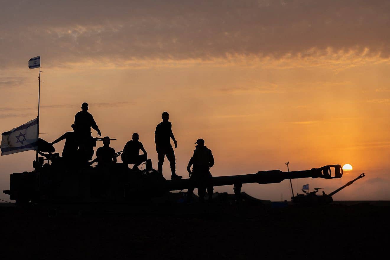 Israeli reserve soldiers at their artillery unit stationed near the southern border with Gaza on Nov. 13, 2023. Photo by Yonatan Sindel/Flash90.