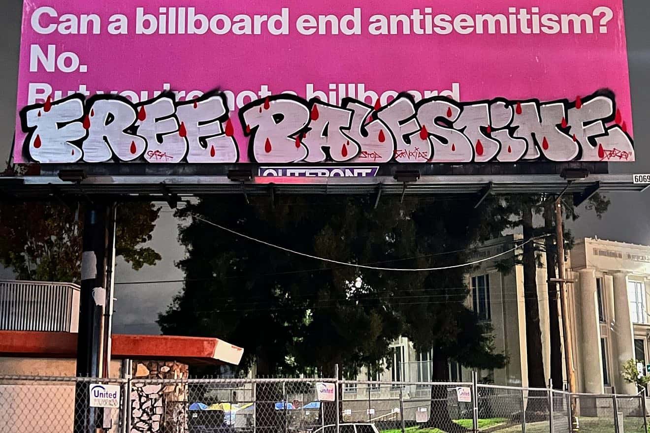 A billboard at Broadway and 42nd Street in Oakland, Calif., associated with the nonprofit JewBelong, aiming to teach the public about antisemitism, is vandalized, November 2023. Credit: Courtesy.