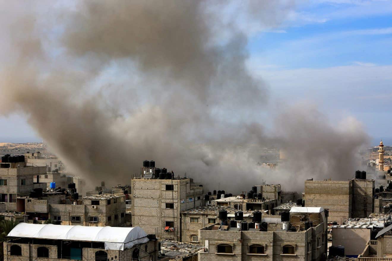 Smoke rises after Israeli air strikes as seen from Khan Younis, in the southern Gaza Strip, Nov. 11, 2023. Photo by Abed Rahim Khatib/Flash90.