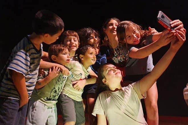 Children evacuated from Moshav Yevul at a hostel near the Dead Sea. Photo courtesy of Moshav Yevul.
