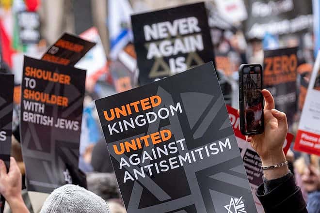 Pro-Israeli protesters at the “March Against Antisemitism” in London on Nov. 26, 2023. Credit: Andy Soloman/Shutterstock.