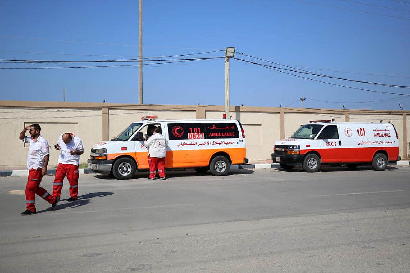 Red Crescent ambulances at the Rafah border crossing in the southern Gaza Strip, Nov. 1, 2023. Photo by Majdi Fathi/TPS.