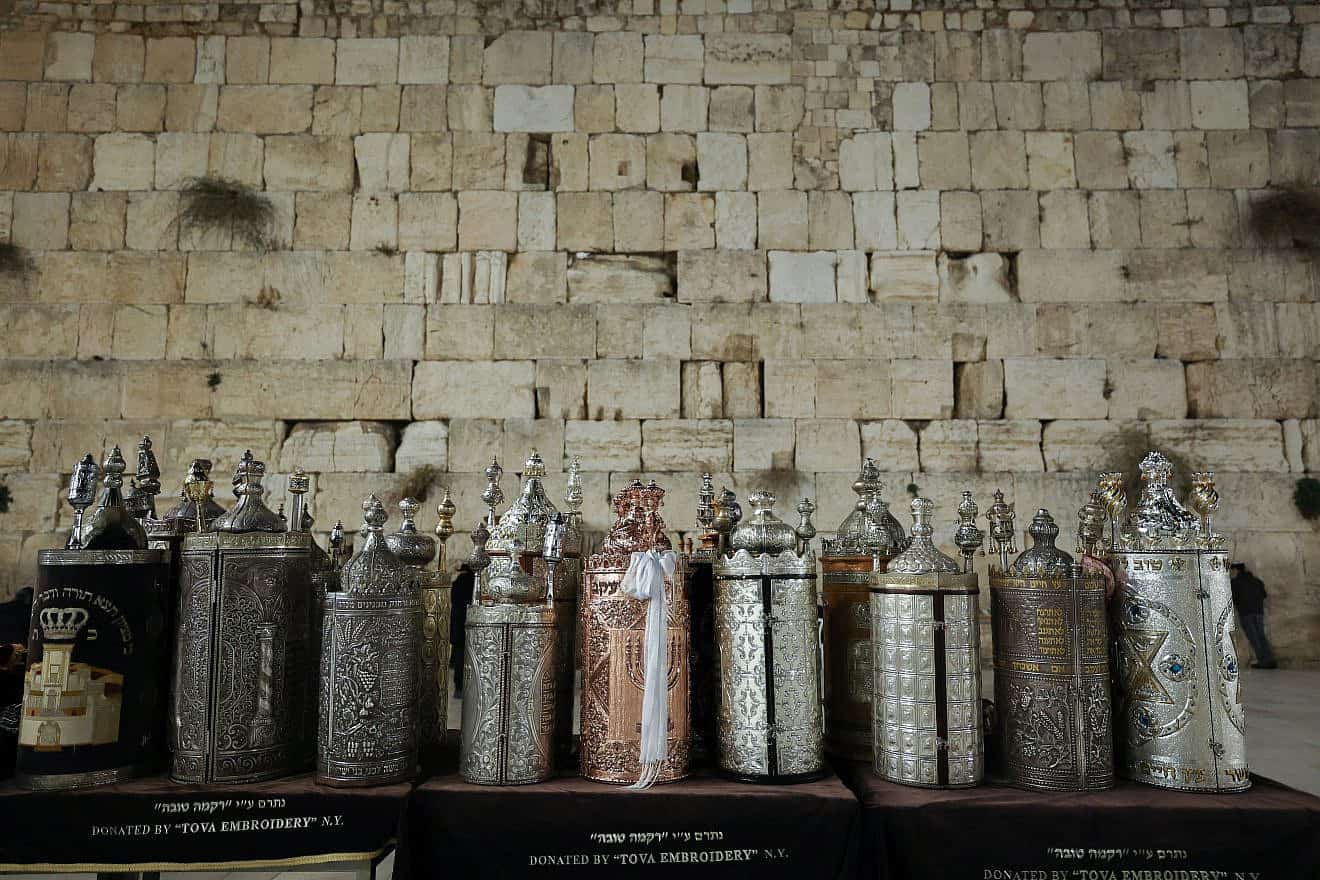 Two new Torah scrolls have been dedicated to the memory of Israeli civilians and soldiers killed in the Oct 7 Hamas terrorist attacks and ongoing war, in addition to  the hostages being held in Gaza, at the Western Wall in Jerusalem's Old City, Nov. 21, 2023. Photo by Yonatan Sindel/Flash90.