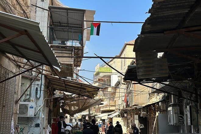 A PLO flag hangs in Jerusalem's Mea Shearim neighborhood. Credit: Israel Police.
