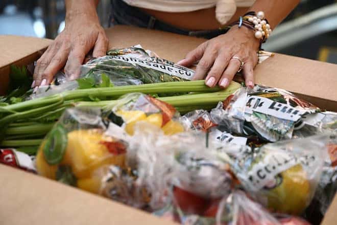 Israelis buy produce grown near the Gaza Strip, at the Azrieli Center in Tel Aviv, Oct. 26, 2023. Photo by Gideon Markowicz/TPS.