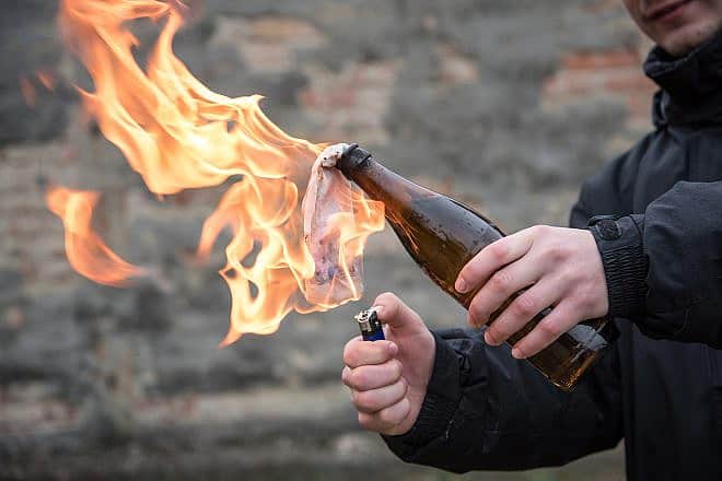A Molotov cocktail. Credit: SasaStock/Shutterstock.