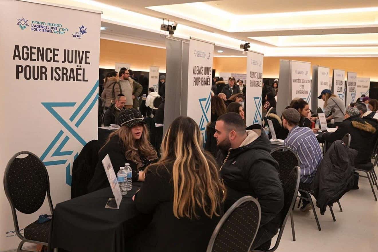 Attendees of a fair in Paris that offering information on immigration to Israel, Dec. 16, 2023. Credit: The Jewish Agency for Israel.