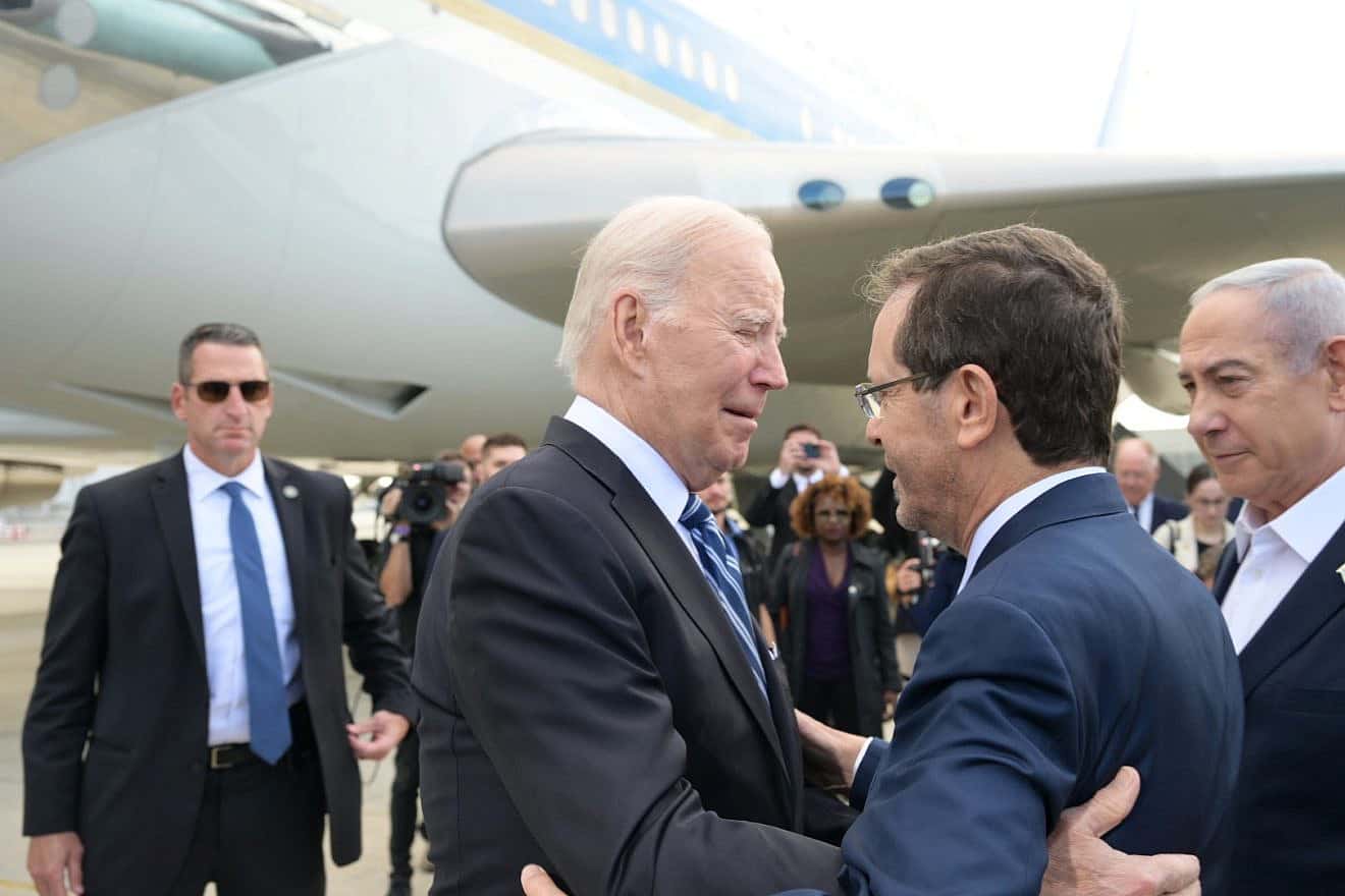 U.S. President Joe Biden is greeted by Israeli President Isaac Herzog (center) and Israeli Prime Minister Benjamin Netanyahu upon his arrival at Ben-Gurion International Airport on Oct. 18, 2023. Credit: Amos Ben Gershom/Israeli President's Spokesperson's Unit.