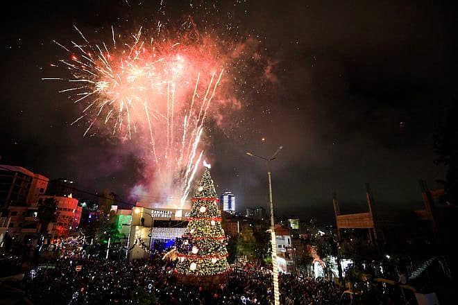 Fireworks during a Christmas tree lighting ceremony in the Samaria city of Ramallah, Dec. 1, 2018. Credit: Flash90.