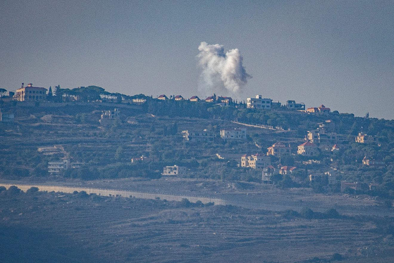 Smoke rises following an exchange of fire between the IDF and Hezbollah terrorists on the border between Israel and Lebanon, Dec. 3, 2023. Photo by Ayal Margolin/Flash90.