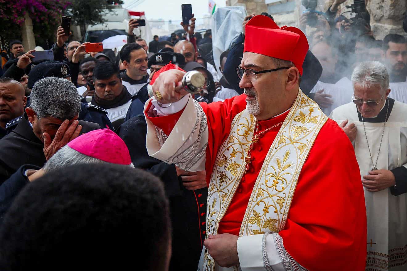 Latin Patriarch of Jerusalem Pierbattista Pizzaballa at the annual Christmas eve procession in the Church of the Nativity in Bethlehem, on Dec. 24, 2023. Photo by Wisam Hashlamoun/Flash90.