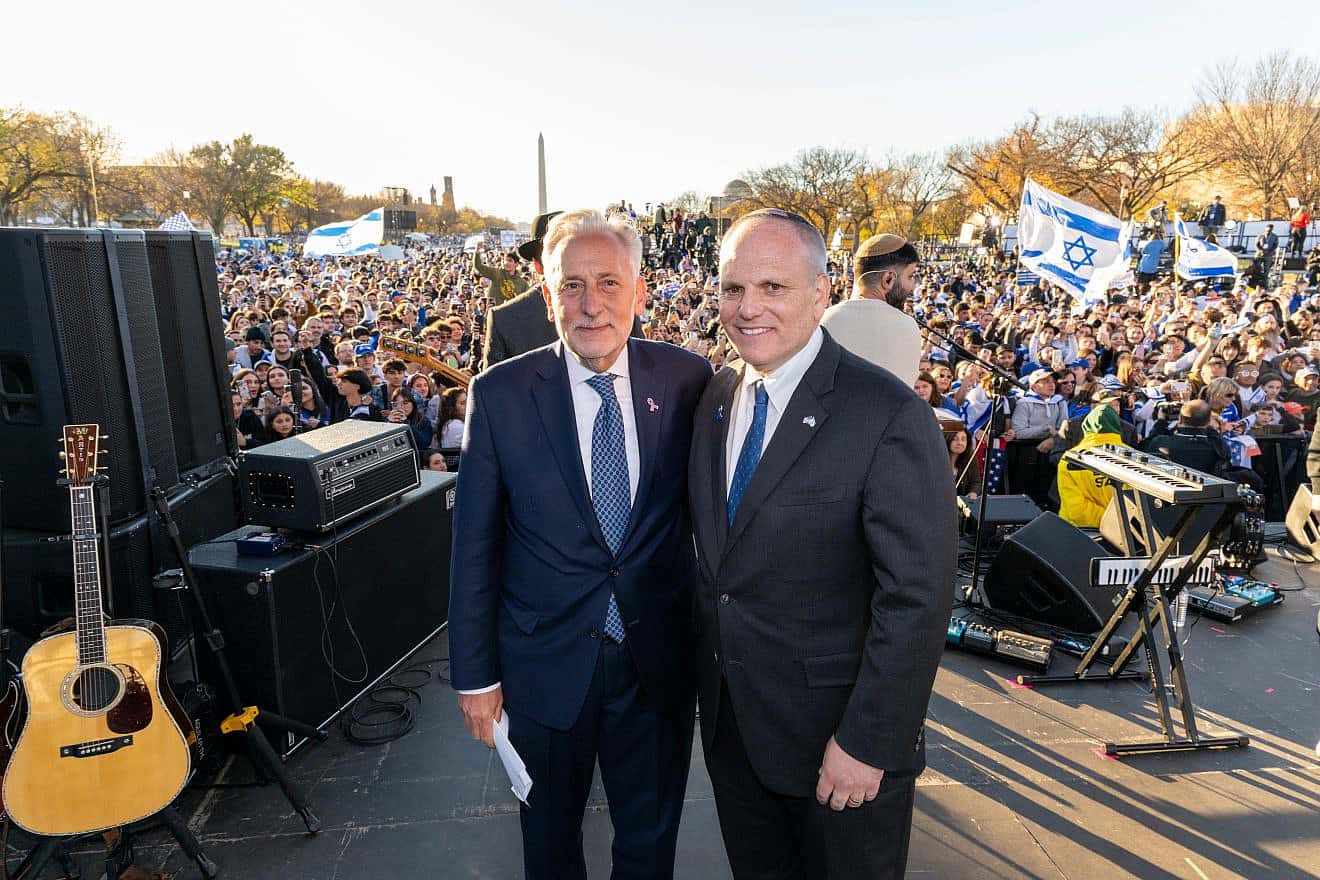 Eric Fingerhut (left), president and CEO of the Jewish Federations of North America, and William Daroff, CEO of the Conference of Presidents of Major American Jewish Organizations in front of an audience of about 300,000 at the “March for Israel” rally in Washington, D.C., on Nov. 14, 2023. Credit: Laurence Levin/JFNA.