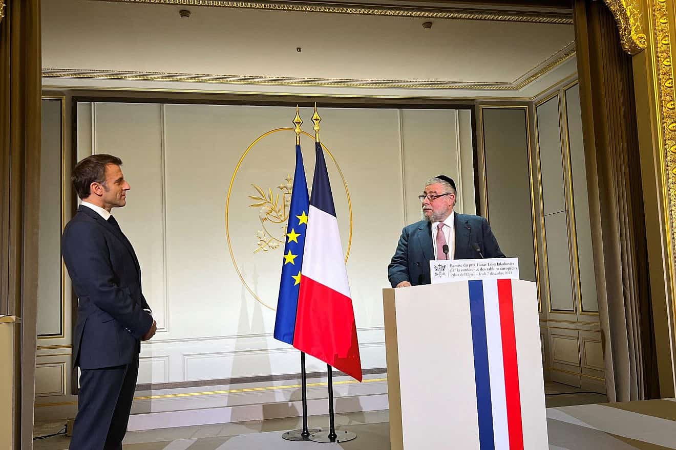 Conference of European Rabbis Chief Rabbi Pinchas Goldschmidt presents the Rabbi Lord Jakobovits Prize of European Jewry to French President Emmanuel Macron on Dec. 7, 2023. Credit: Courtesy of CER.