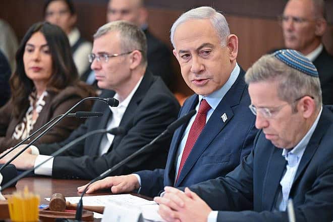 Israeli Prime Minister Benjamin Netanyahu leads a government meeting, Dec. 10, 2023. Photo by Kobi Gideon/GPO.
