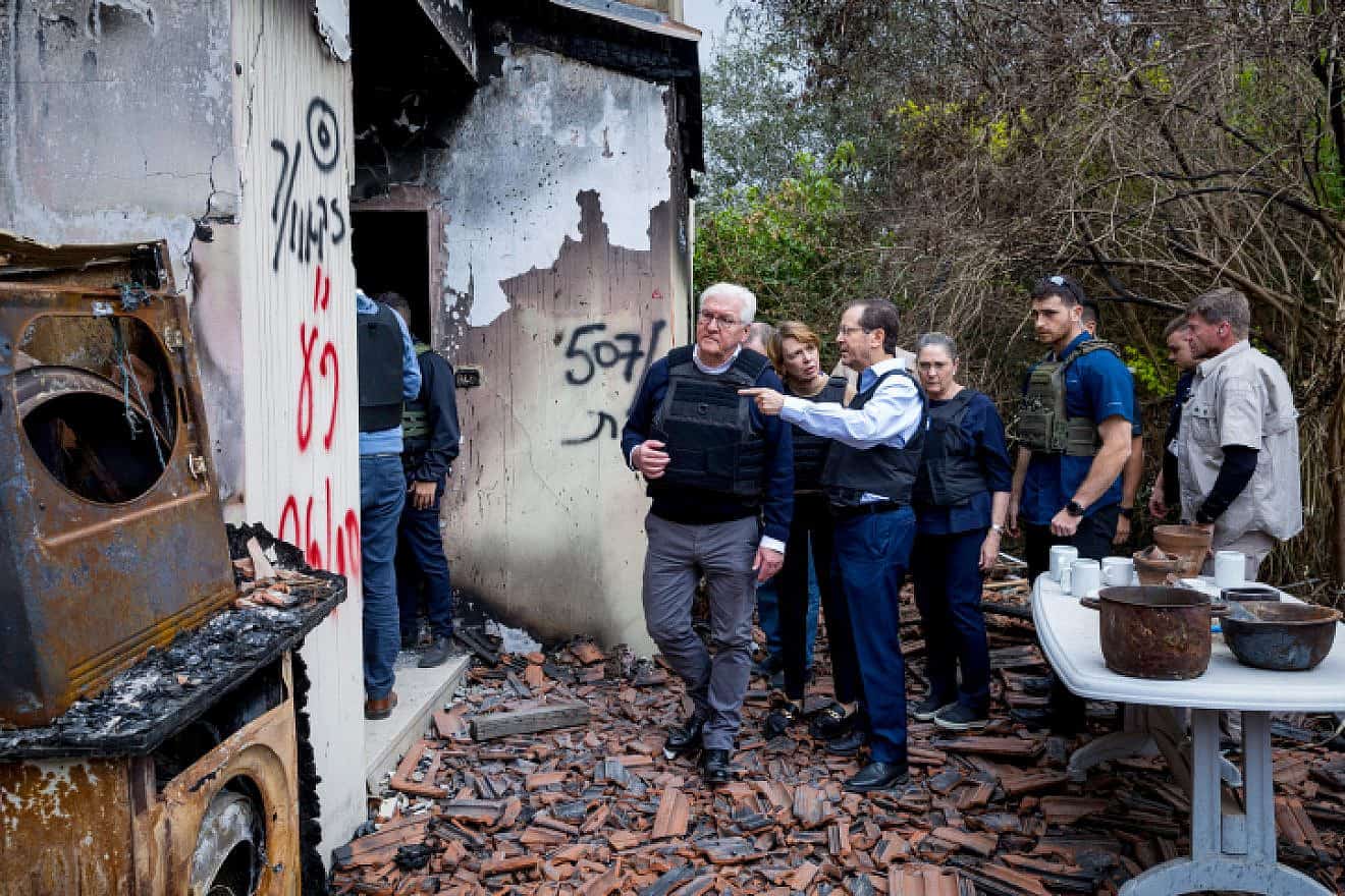 Israeli President Isaac Herzog takes German President Frank-Walter Steinmeier to Kibbutz Kfar Aza in southern Israel to witness the destruction left by Hamas terrorists, Nov. 27, 2023. Photo by Liron Moldovan/POOL.