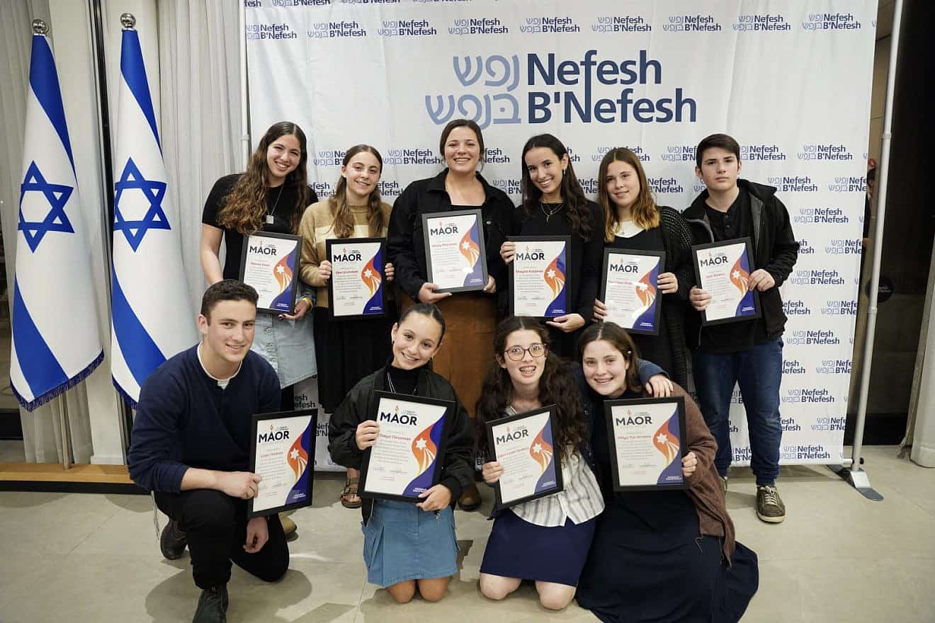 Nefesh B'Nefesh grants its Maor Prize to 10 outstanding young olim for their contributions to strengthen the State of Israel during war against Hamas, December 2023. Credit: Nefesh B'Nefesh.