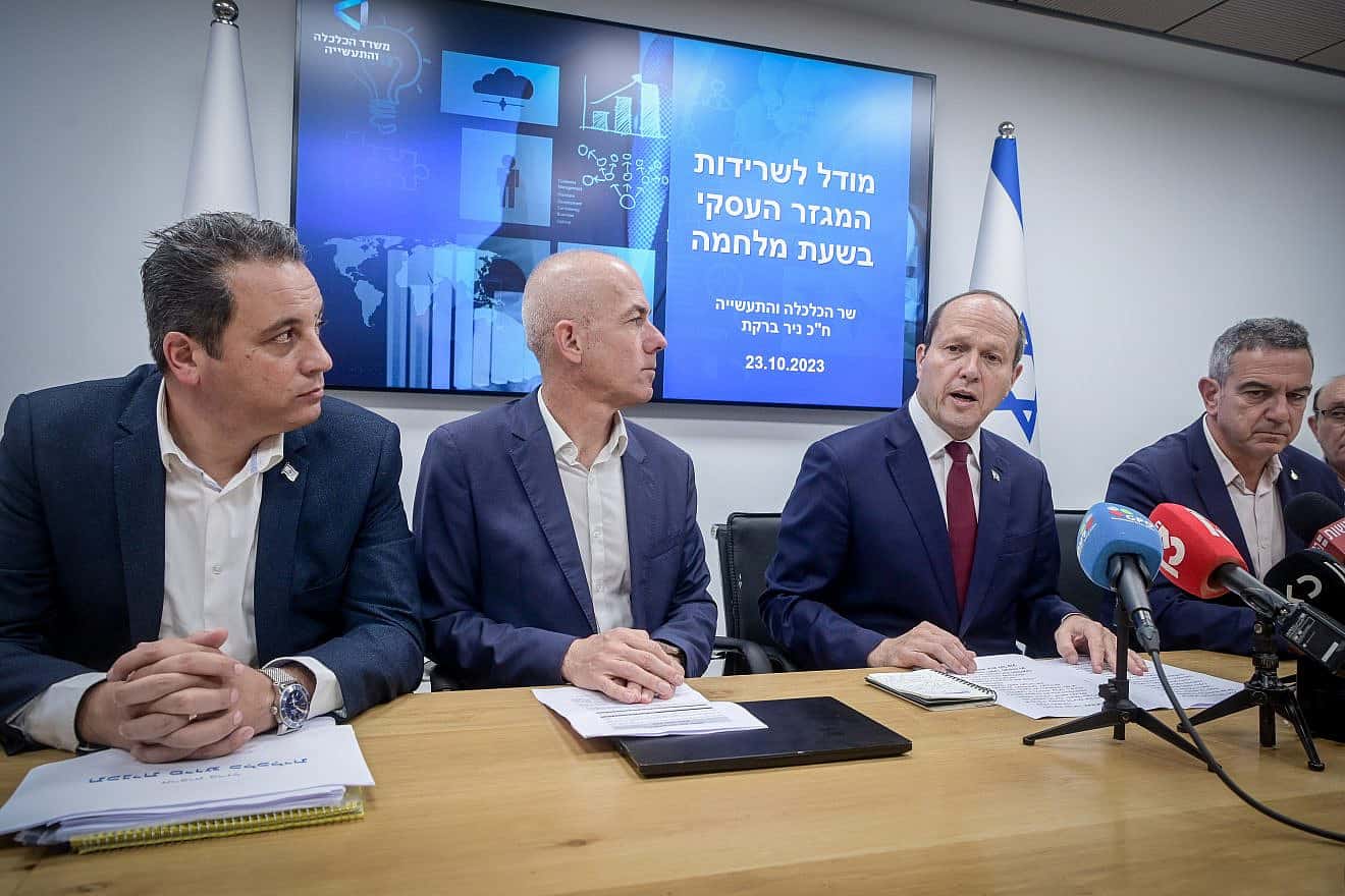 Israeli Economy Minister Nir Barkat (third from left) at a meeting with heads of the business sector in Israel in Tel Aviv on Oct. 23, 2023. Photo by Avshalom Sassoni/Flash90.