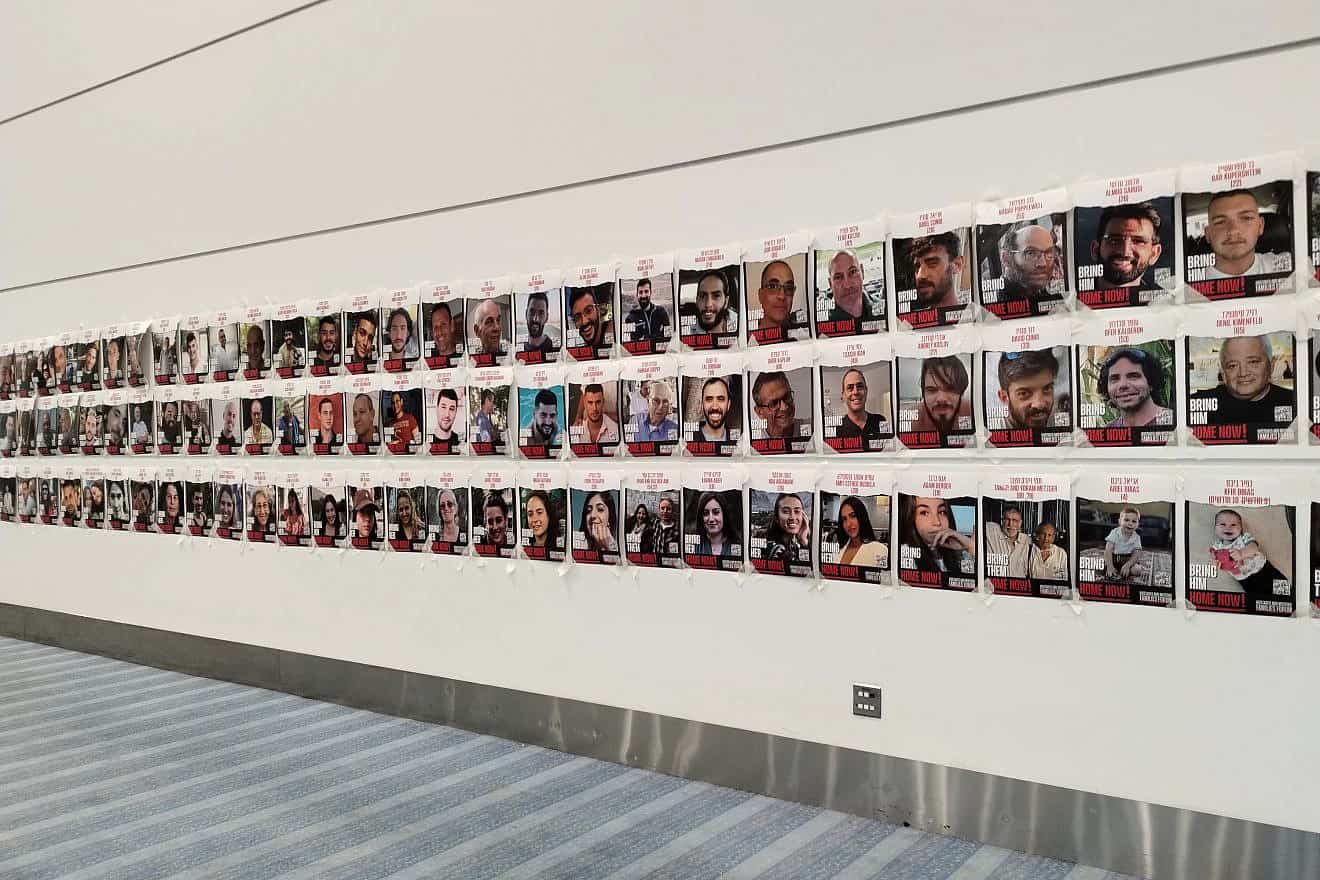 Photos of Israeli civilians kidnapped by Hamas terrorist on Oct. 7, and taken back into captivity in the Gaza Strip, on display at the Colorado Convention Center in downtown Denver, the site of the opening plenary of the Jewish National Fund-USA annual conference, Nov. 30, 2023. Photo by Carin M. Smilk.