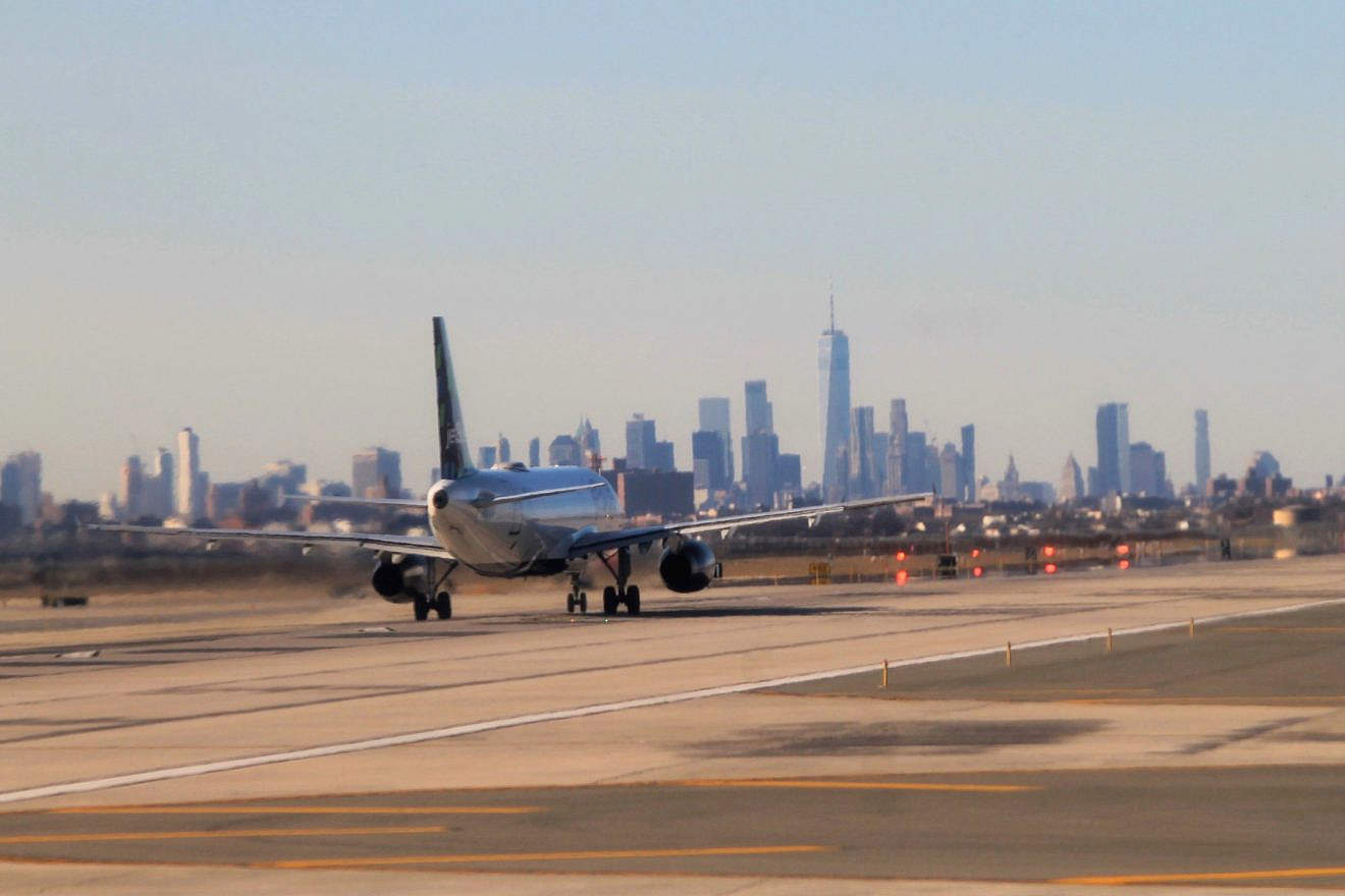 New York City skyline seen from John F. Kennedy Airport, with One World Trade Center in the distance, Jan. 16, 2020. Credit: 	Rickmouser45 via Wikimedia Commons.