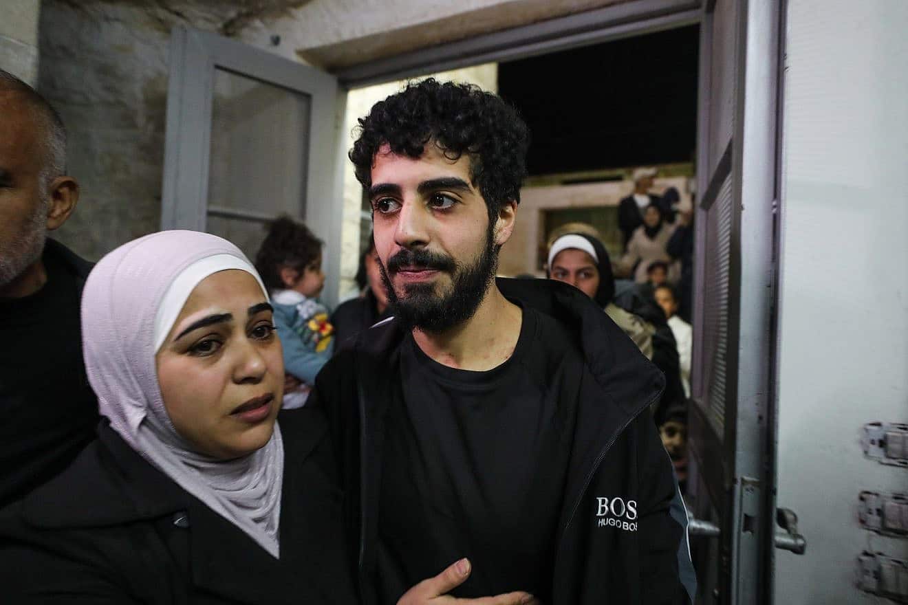 A freed Palestinian convict arrives to his home in eastern Jerusalem after being released as part of a deal between Israel and Hamas for the return of Jewish civilian hostages, Nov. 28, 2023. Photo by Jamal Awad/Flash90.