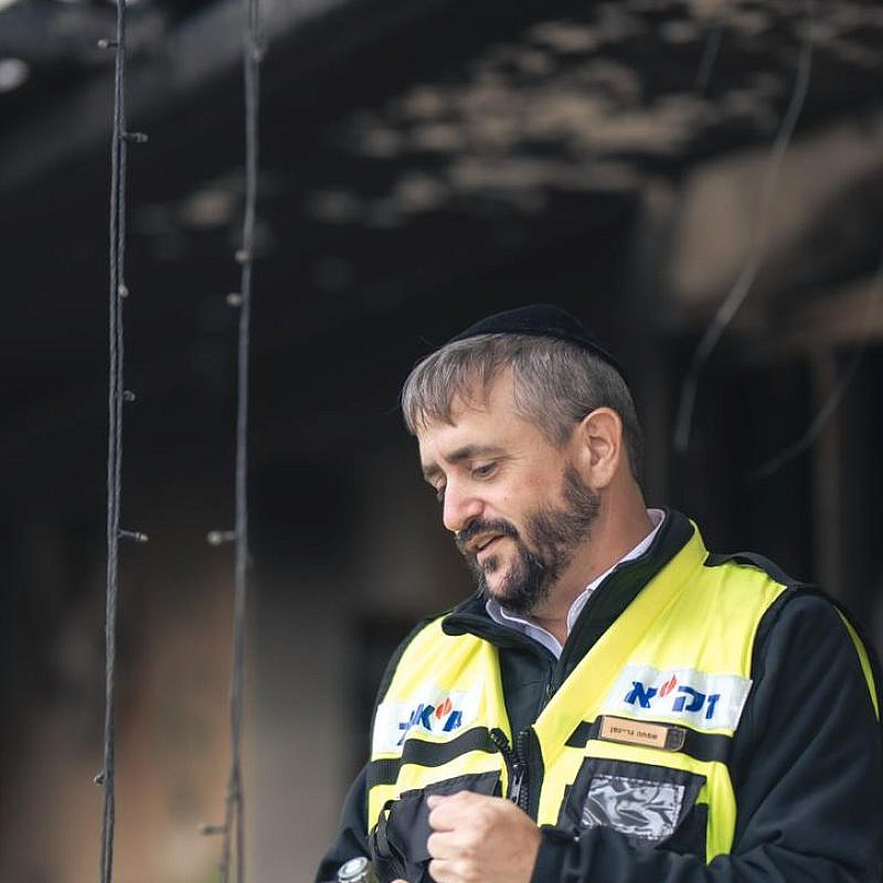 ZAKA volunteer Simcha Greiniman at the site of Hamas's Oct. 7 massacre. Photo courtesy of Simcha Greiniman.