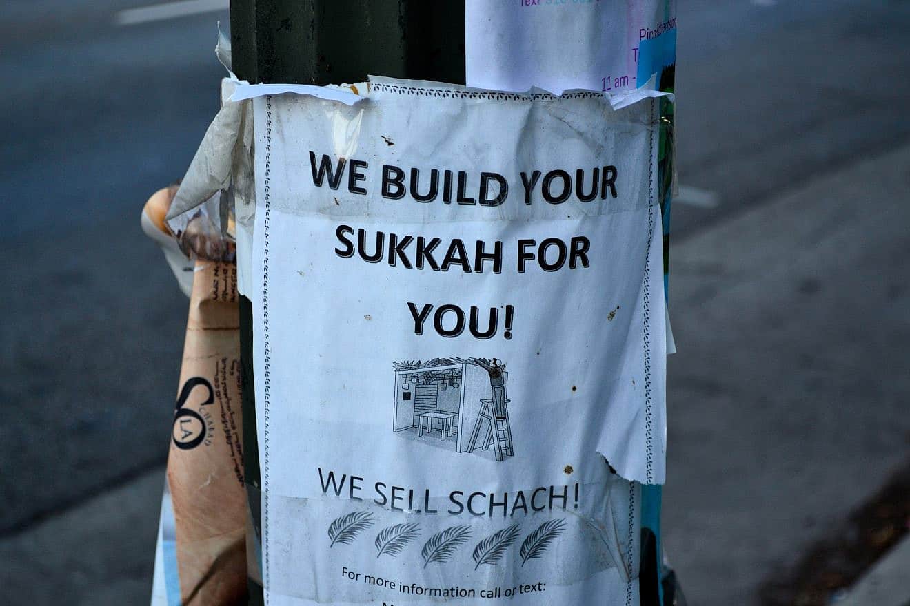 A paper ad for building a sukkah, which is a temporary structure used to celebrate the Jewish holiday of Sukkot, found in the largely Jewish Pico-Robertson neighborhood. Credit: M Lifson/Shutterstock.