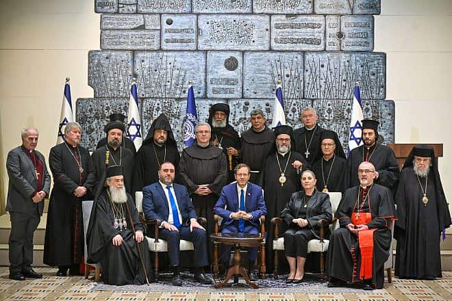 President Isaac Herzog (front center) hosts local Christian leaders, including Greek Patriarch Theophilos III (left center), at his official residence in Jerusalem, Dec. 21, 2023. Photo by Kobi Gideon/GPO.