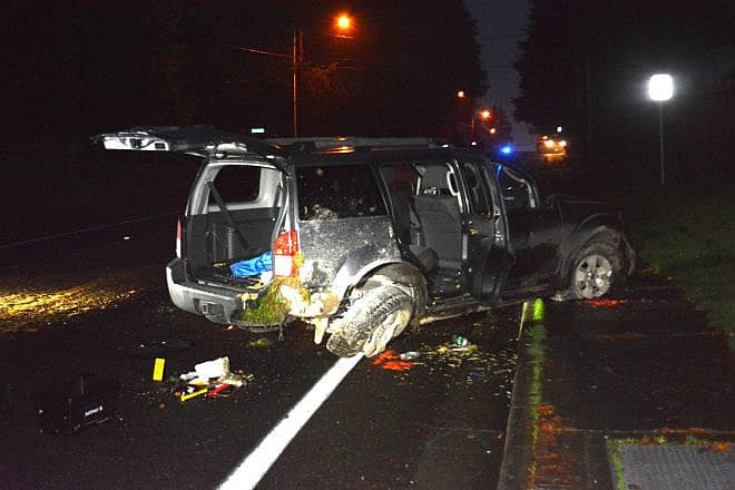 The stolen 2007 gray Nissan Pathfinder that allegedly driven by a 15-year-old that killed a man in Redmond, Wash., on Dec. 6, 2023. Source: Redmond Police.