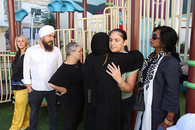 The American Muslim leaders meet in Sderot with Meirav Barkai of Kibbutz Be'eri, whose 81-year-old mother and 20-year-old nephew were murdered in the Hamas attack on Oct. 7. Photo by Yoav Lin.