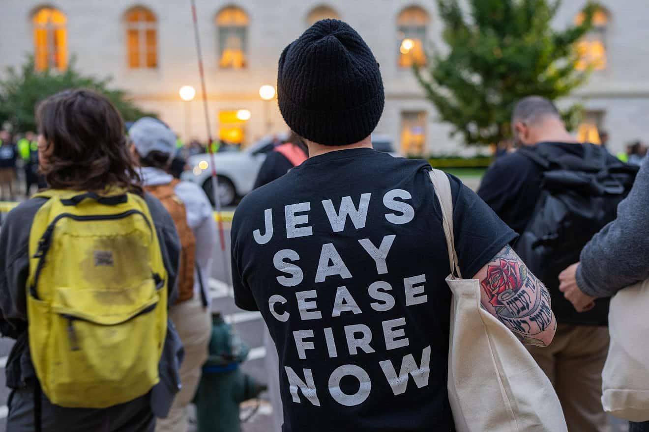 An activist wears a shirt that says "Jews say ceasefire now" in Washington, D.C. on Oct. 19, 2023. Credit: Tverdokhlib/Shutterstock.