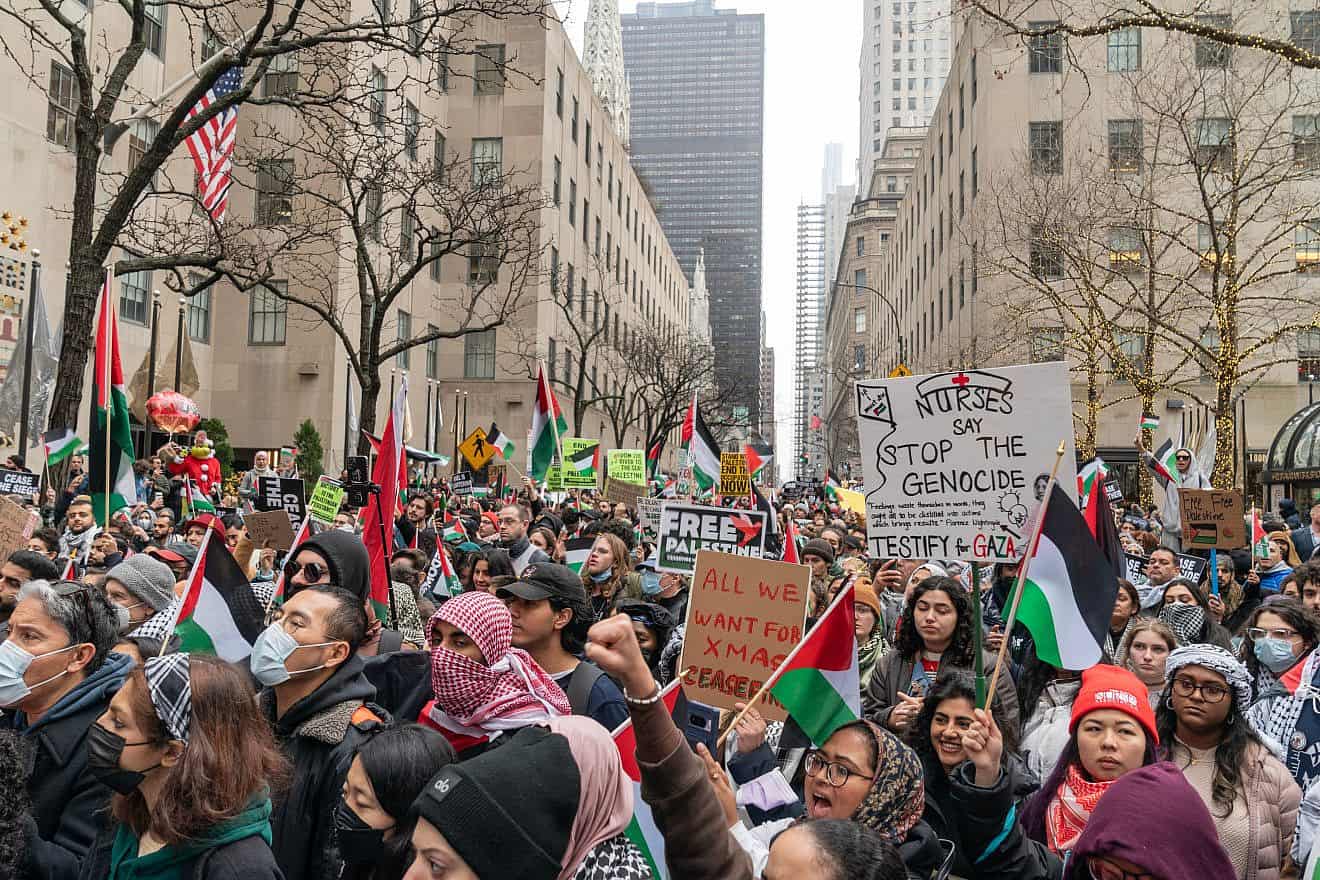 In an anti-Israel "Christmas is Canceled" protest, hundreds marched on Rockefeller plaza and in Midtown Manhattan on Dec. 25, 2023. Credit: Lev Radin/Shutterstock.
