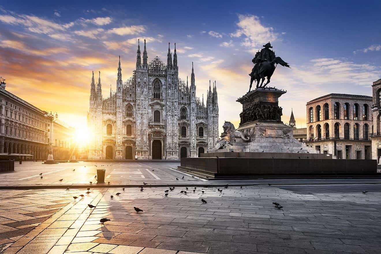 The Duomo at sunrise in Milan, Italy. Credit: ventdusud/Shutterstock.