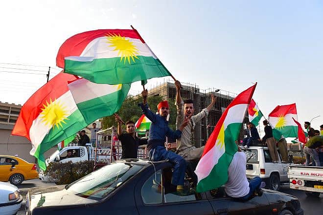 Kurds celebrate an independence referendum on Sept. 25, 2017 in Erbil, Iraq. Credit: Thomas Koch/Shutterstock