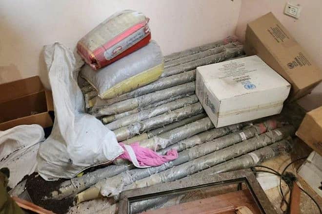 Hamas rockets found hidden among boxes of UNRWA relief supplies in northern Gaza, Dec. 2, 2023. Credit: IDF Spokesperson.
