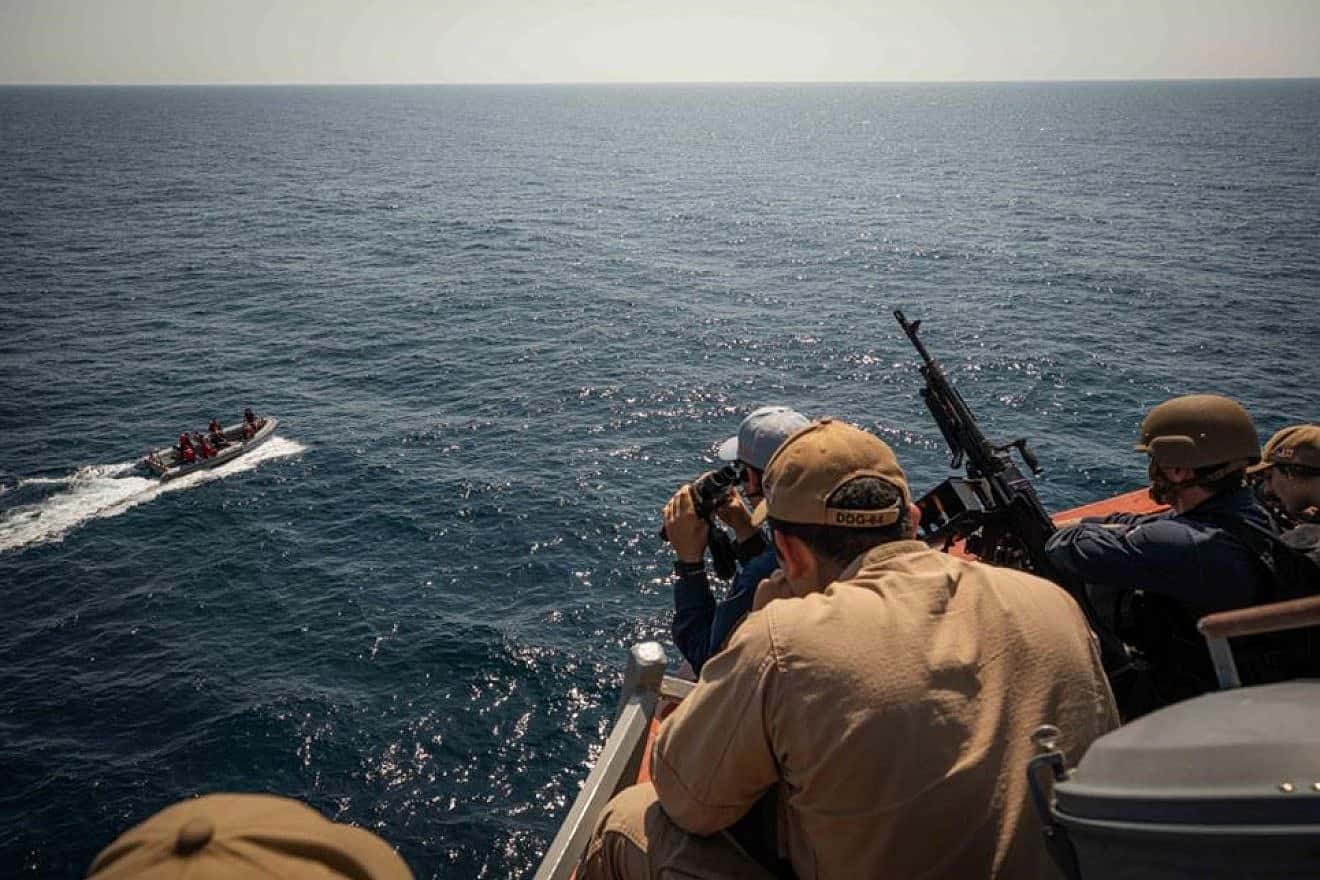 Sailors assigned to the Arleigh Burke-class guided-missile destroyer “USS Carney” respond to a simulated small-craft vessel during an anti-terrorism drill on Dec. 6, 2023. Credit: Mass Communication Specialist 2nd Class Aaron Lau/U.S. Navy.