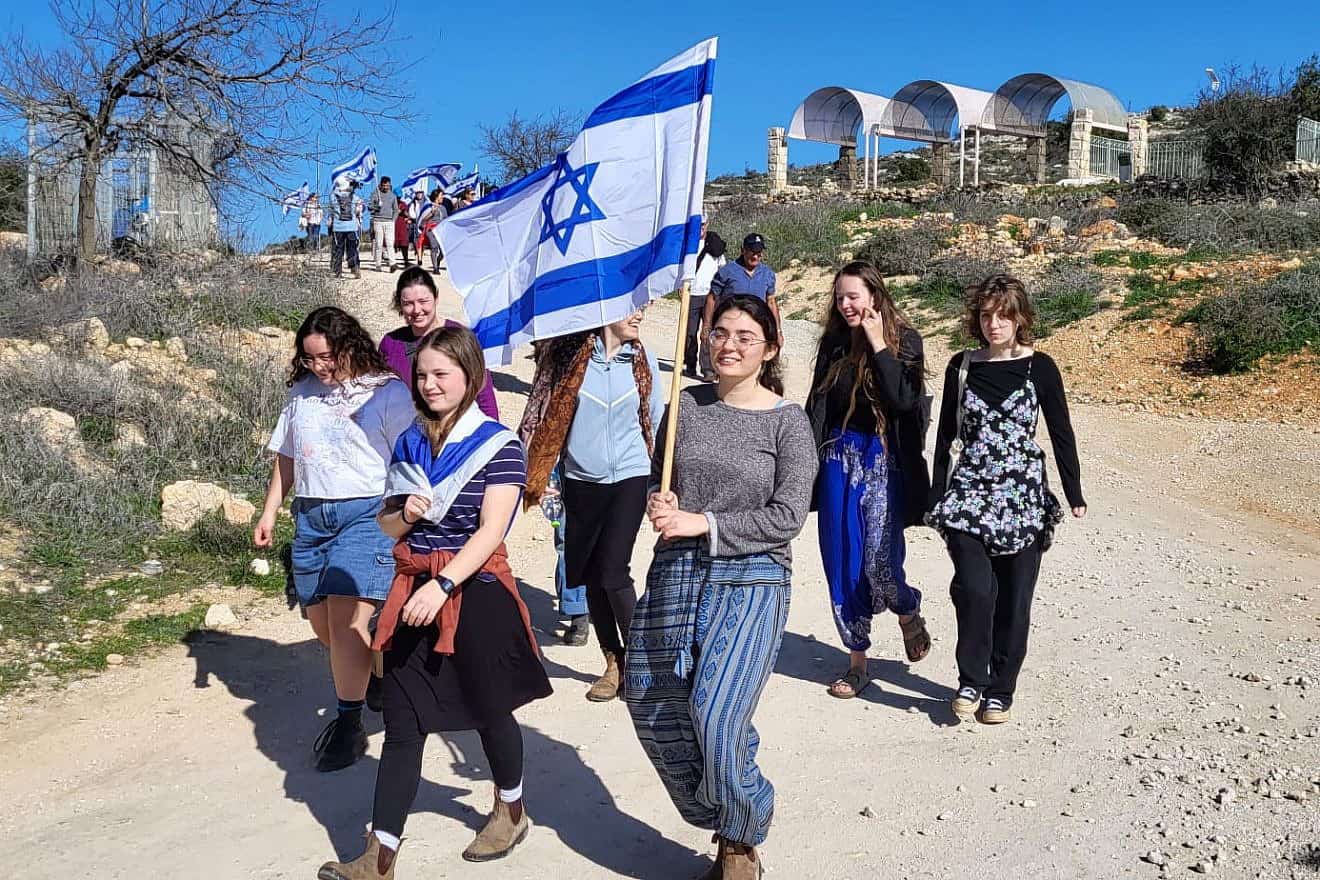 Israelis march along the Path of the Patriarchs in Judea to mark 100 days since Hamas's surprise invasion, Jan. 19, 2024. Credit: Gush Etzion Regional Council.