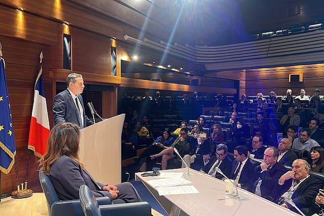 Israel Bar Association head Adv. Amit Becher speaks at a lawyer conference in Paris. Photo by Chaya Cohen.