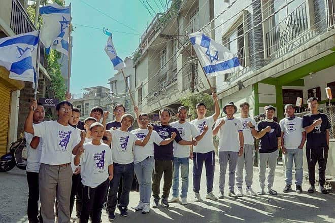 Hundreds of Bnei Menashe stand with the State of Israel during a solidarity march in Aizawl, in the Indian state of Mizoram, on Jan. 15, 2024. Credit: Courtesy of Shavei Israel.
