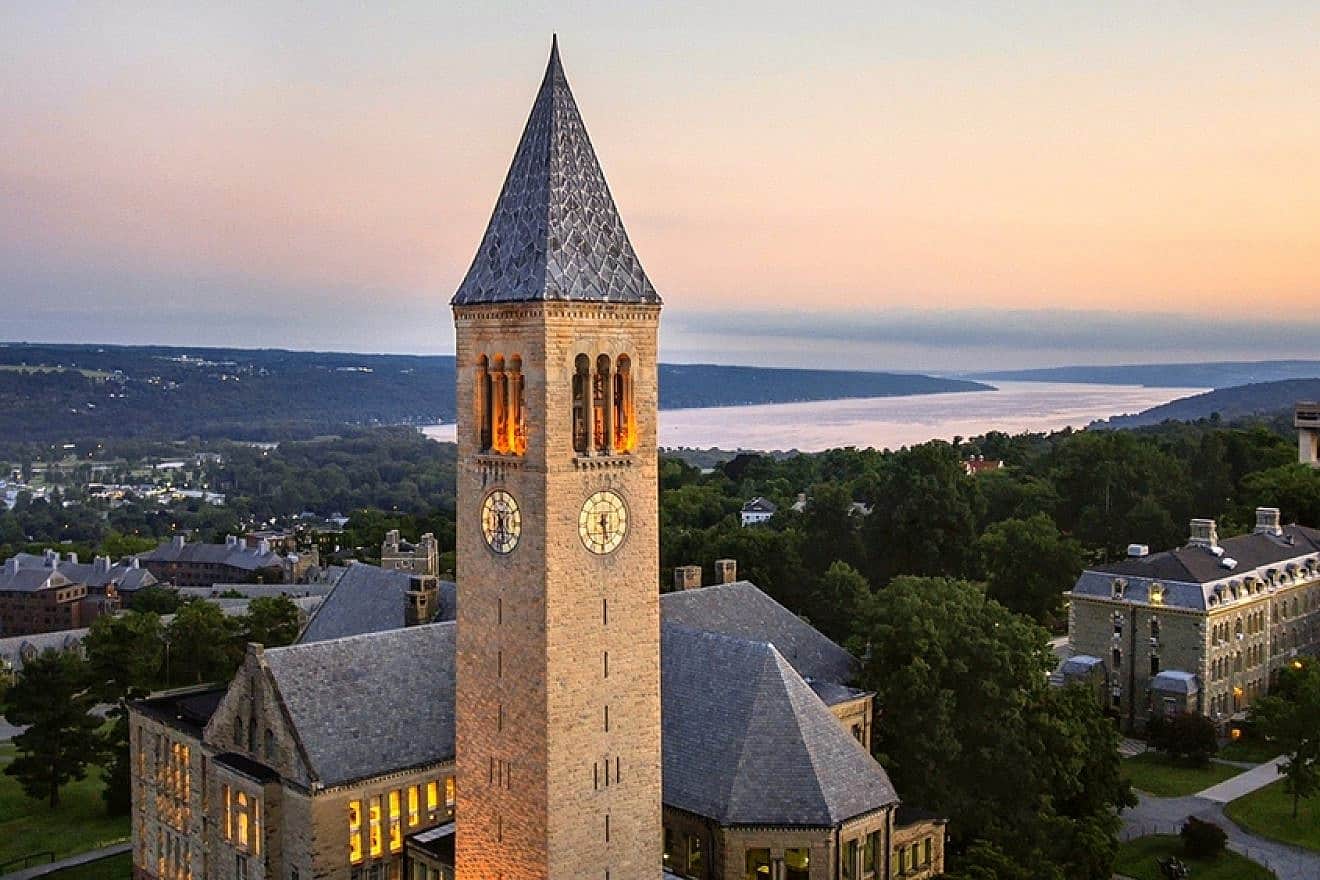 McGraw Tower and Uris Library at Cornell University in Ithaca, N.Y., with Morrill Hall and Cayuga Lake in the background. Credit: Dantes De MonteCristo via Wikimedia Commons.