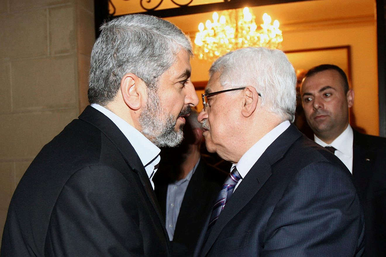 Palestinian Authority leader Mahmoud Abbas with Hamas leader Khaled Mashaal in Cairo on Feb. 23, 2012. Credit:  Mohammed al-Hums/Flash 90.