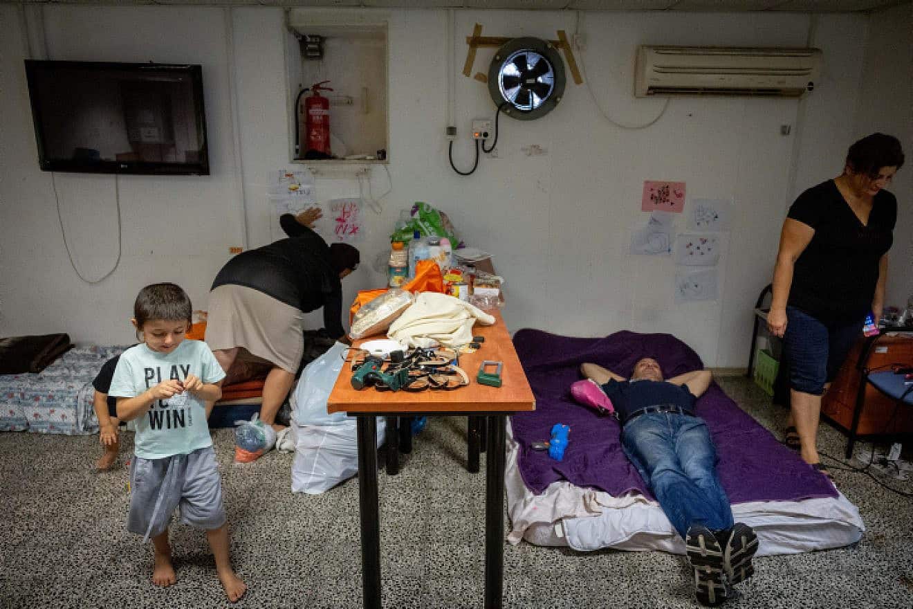 Israelis inside a public bomb shelter in the Southern city of Ashkelon, Oct. 24, 2023. Photo by Yonatan Sindel/Flash90.