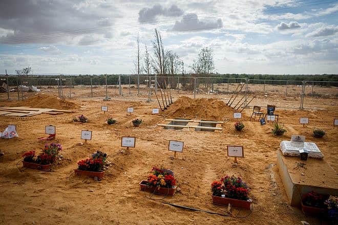 Graves of Kibbutz Be'eri residents who were murdered by Hamas terrorists on Oct. 7, 2023. Photo: Chaim Goldberg/Flash90