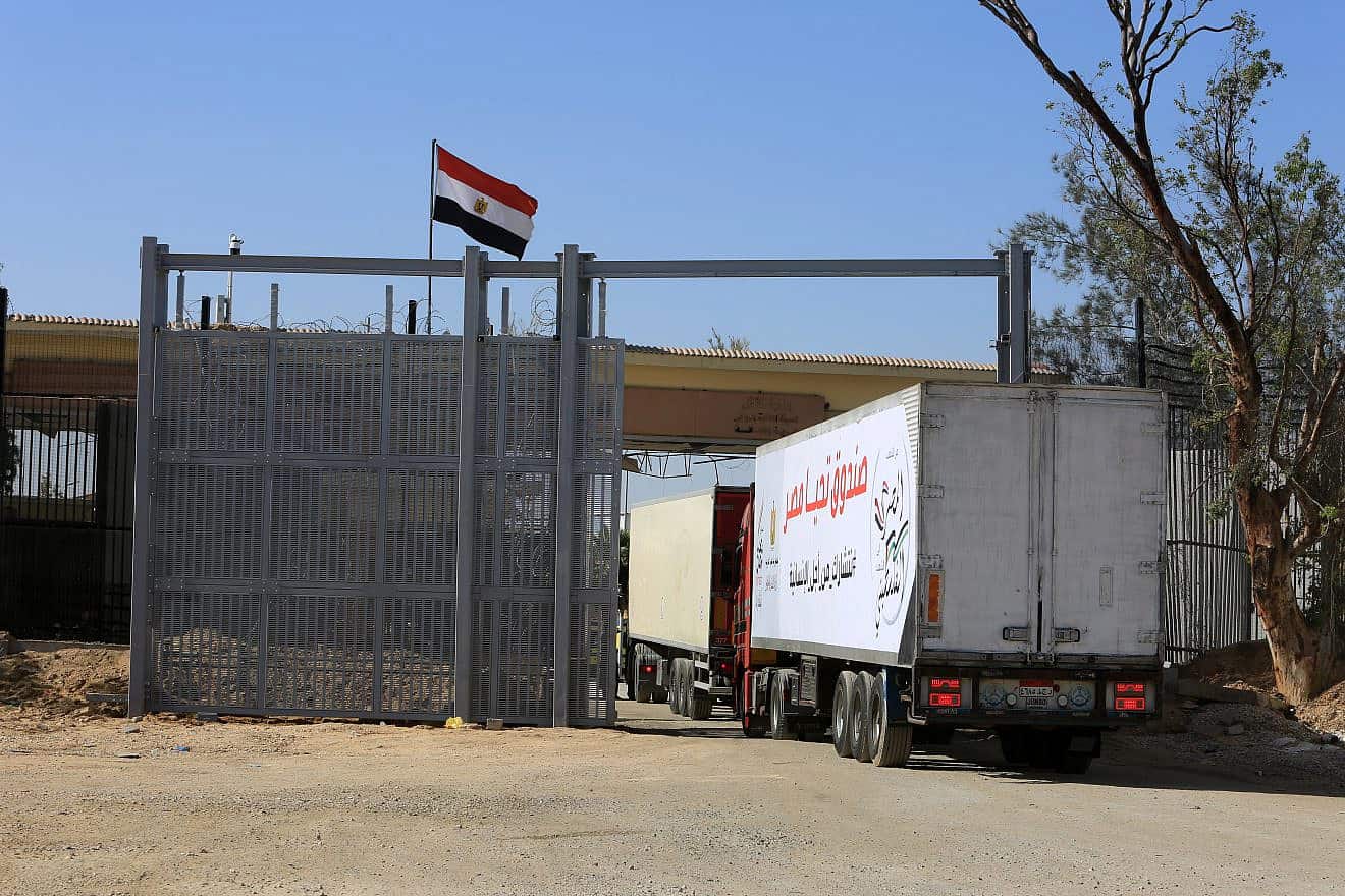Trucks with humanitarian aid arrive at the Gaza side of the Rafah border crossing with Egypt, Nov. 24, 2023. Photo by Abed Rahim Khatib/Flash90.