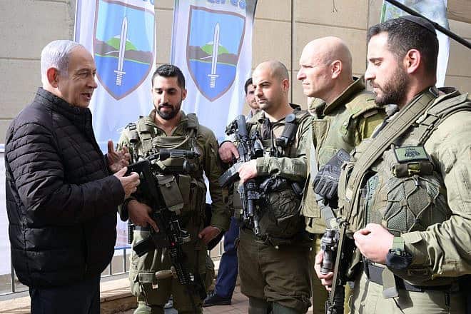 Israeli Prime Minister Benjamin Netanyahu visits Israel Defense Forces troops on the country's northern border, Jan. 8, 2023. Credit: Amos Ben Gershom/GPO.
