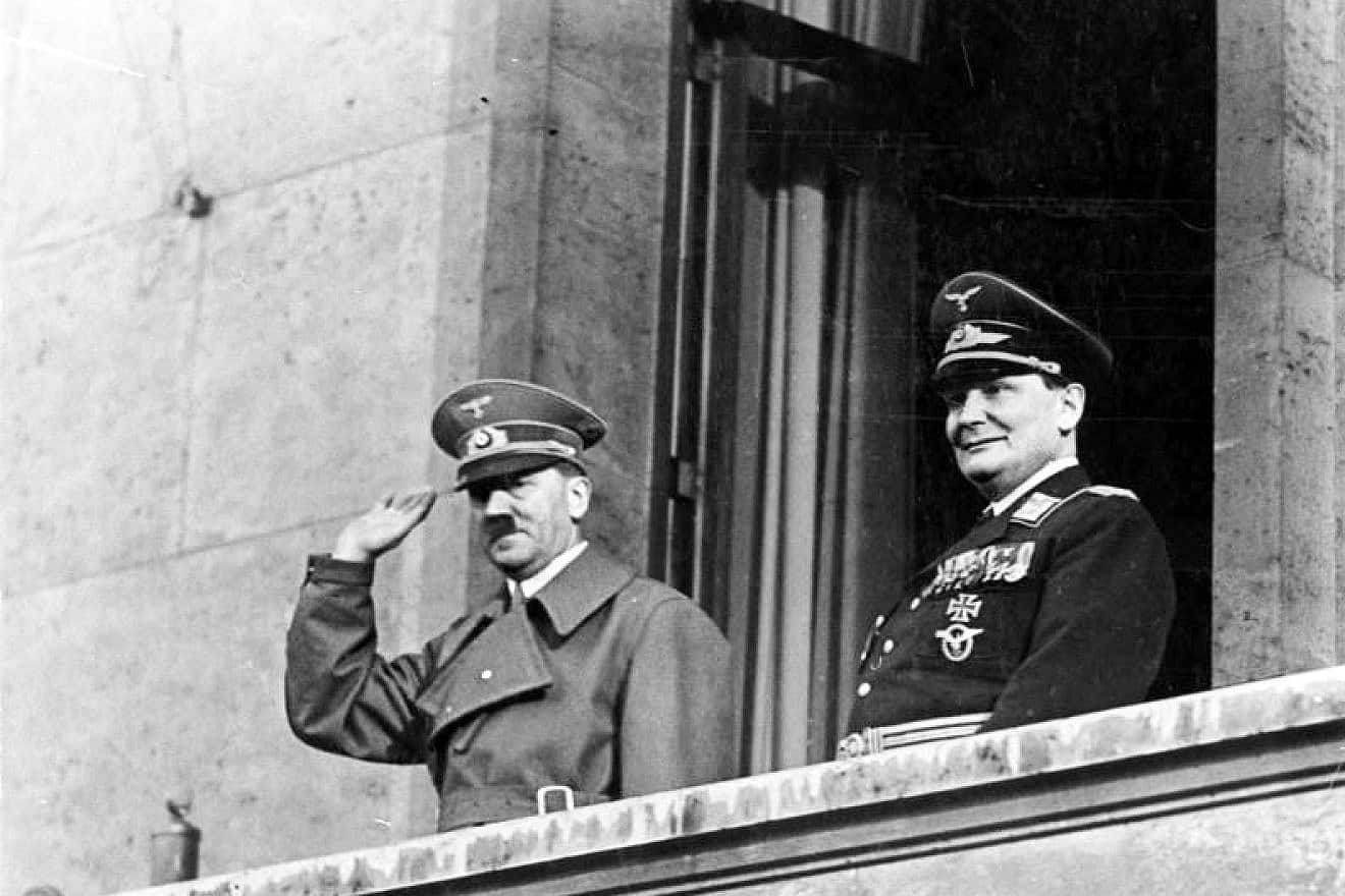 Adolf Hitler and Hermann Göring on balcony of the Chancellery in Berlin on March 16, 1938. Credit: German Federal Archives via Wikimedia Commons.