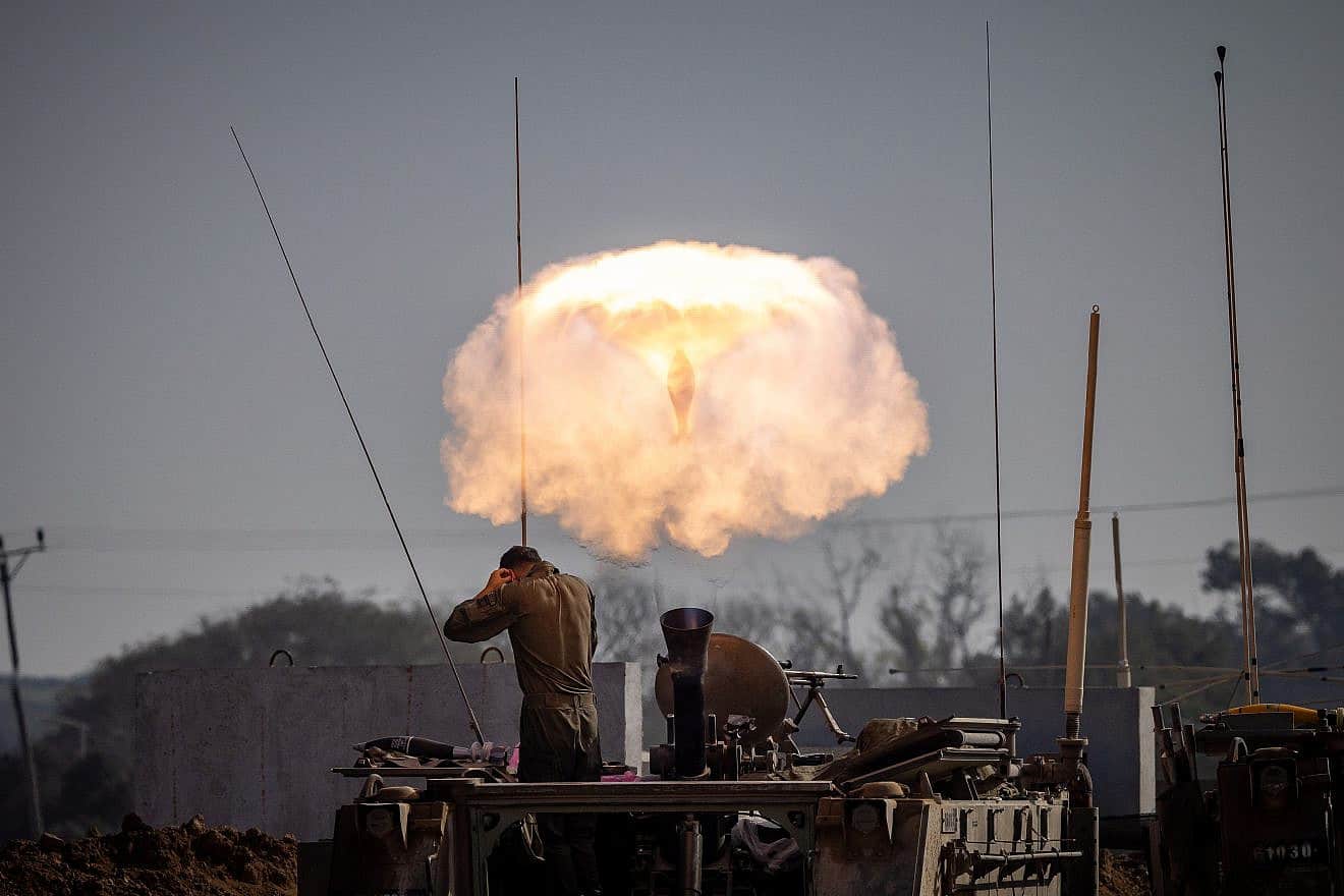 Israeli soldiers fire mortar shells towards targets in the Gaza Strip on Jan. 1, 2024. Photo by Chaim Goldberg/Flash90.