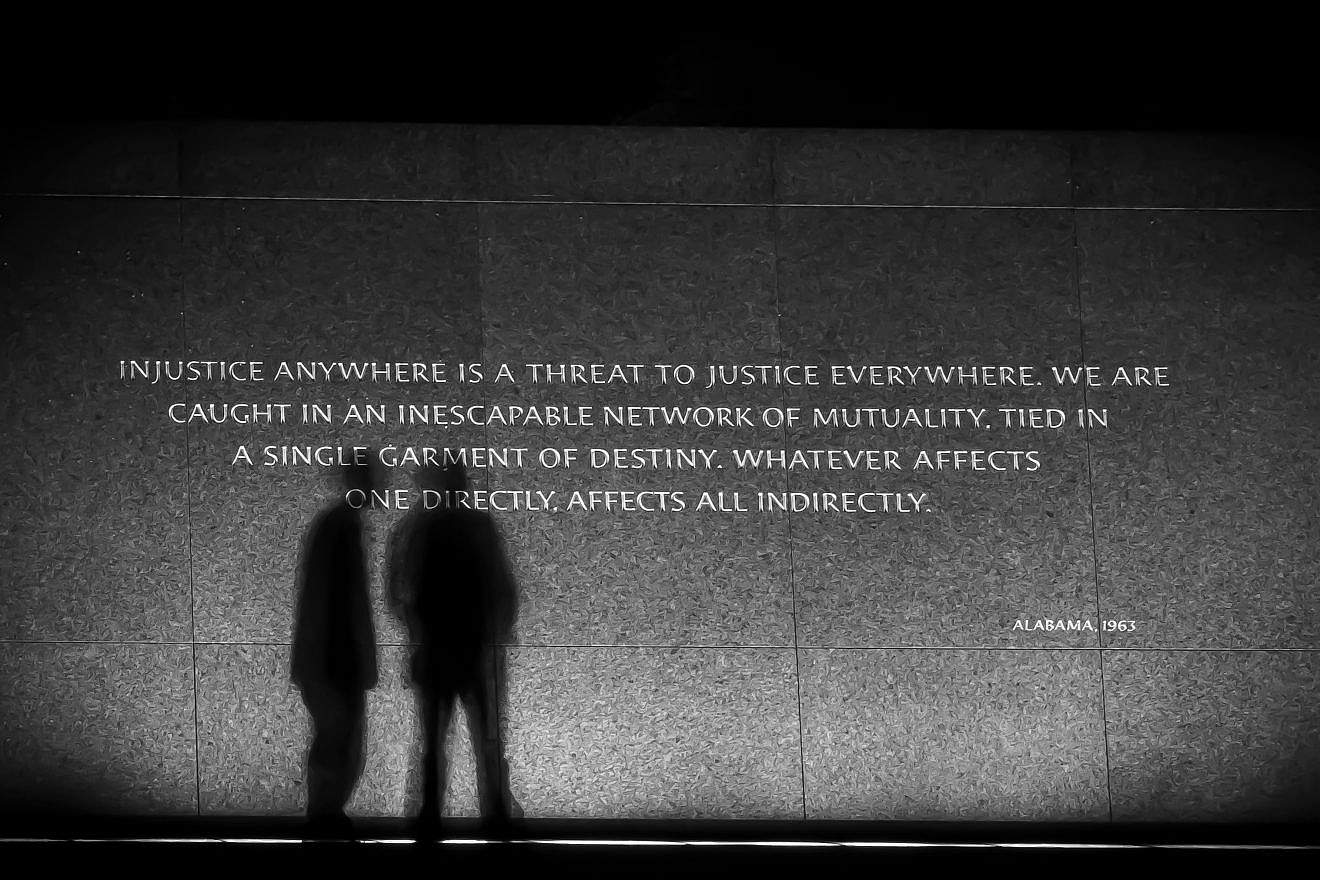 Black-and-white picture of a Rev. Martin Luther King Jr. memorial quote in Washington, D.C. Credit: John S. Quinn/Shutterstock.