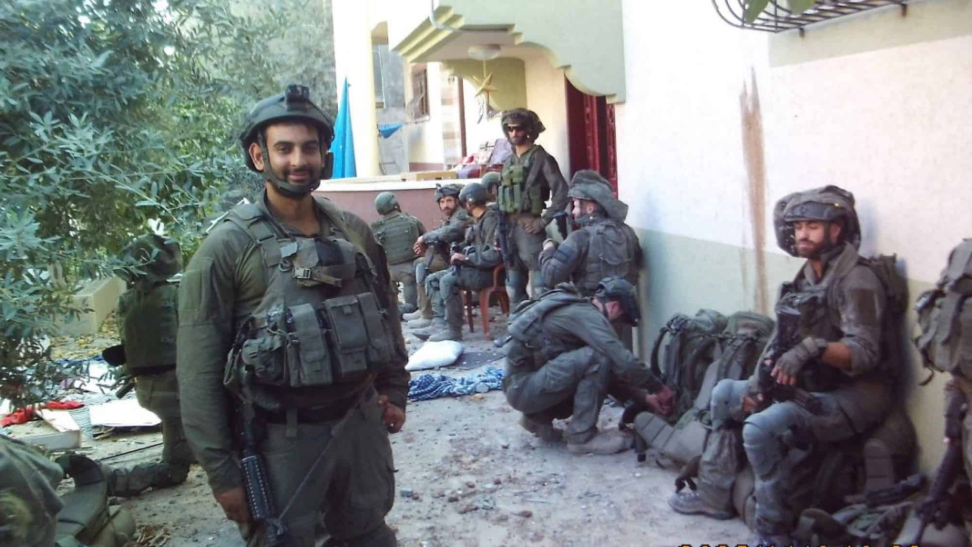 Netanel Sharvit and comrades from the IDF Paratroopers Reconnaissance Battalion take a break in the Gaza Strip, Nov. 6, 2023. Credit: Courtesy.